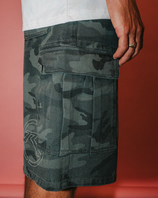 Man wearing Commando Camo Cargo Short in Overdyed Camo