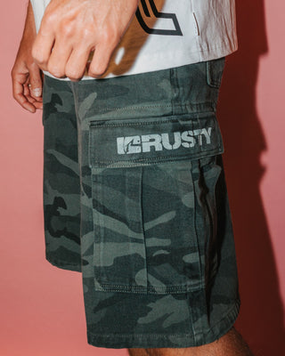 Man wearing Commando Camo Cargo Short in Overdyed Camo