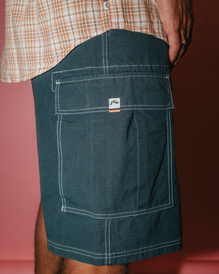Man wearing Commando Rippa Cargo Short in Dark Sapphire