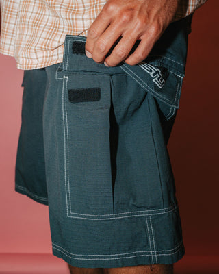 Man wearing Commando Rippa Cargo Short in Dark Sapphire