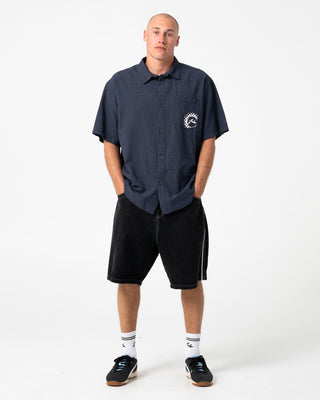 man-wearing-flip-daddy-2-0-jort-black-out-in-black-out