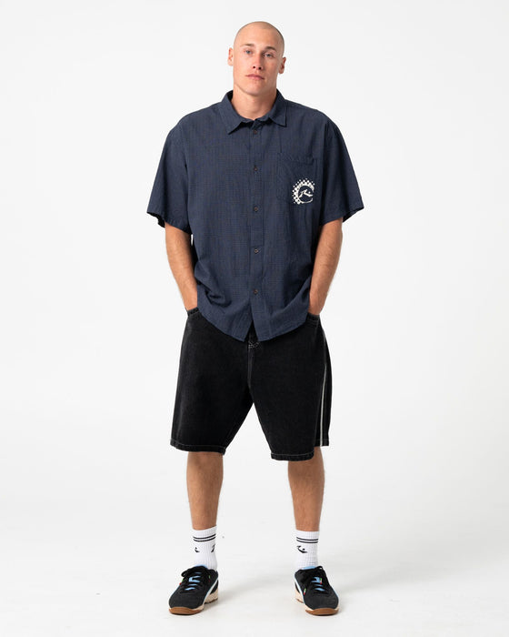 man-wearing-flip-daddy-2-0-jort-black-out-in-black-out