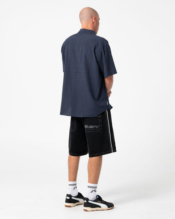 man-wearing-flip-daddy-2-0-jort-black-out-in-black-out