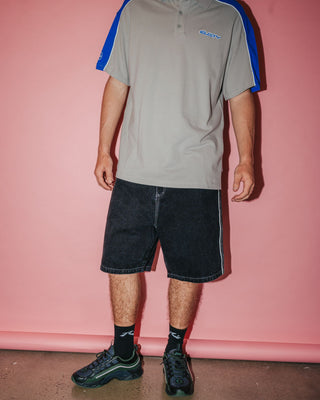 Man wearing Flip Daddy 2.0 Jort - Black Out in Black Out