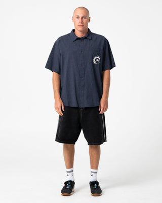 Man wearing Flip Daddy 2.0 Jort - Black Out in Black Out