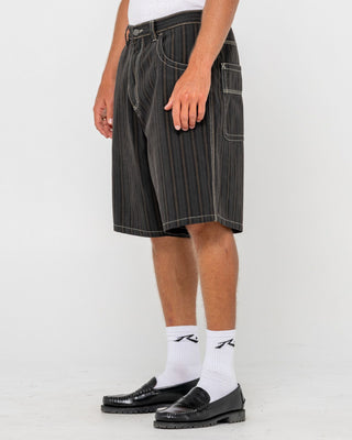 Man wearing Flip Pinstripe Jort in Black