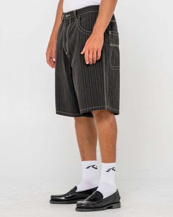 man-wearing-flip-pinstripe-jort-in-black