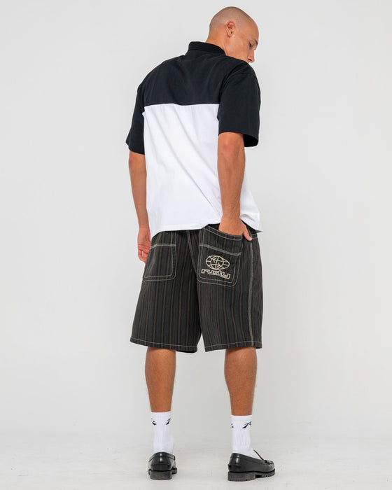 man-wearing-flip-pinstripe-jort-in-black