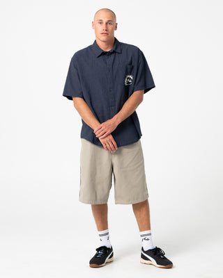 Man wearing Request Line Herringbone Short in Abbey Stone