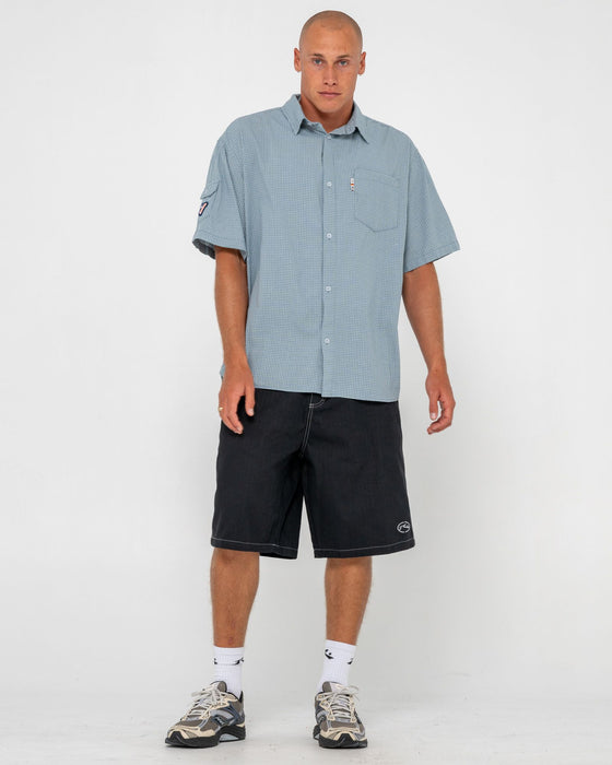 man-wearing-request-line-herringbone-short-in-black