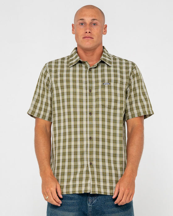 man-wearing-datsun-check-short-sleeve-shirt-in-army-green