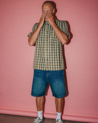 Man wearing Datsun Check Short Sleeve Shirt in Army Green