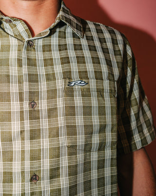 Man wearing Datsun Check Short Sleeve Shirt in Army Green