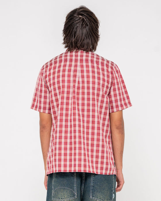 man-wearing-datsun-check-short-sleeve-shirt-in-vintage-red