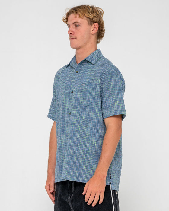 man-wearing-datsun-drop-short-sleeve-shirt-in-china-blue