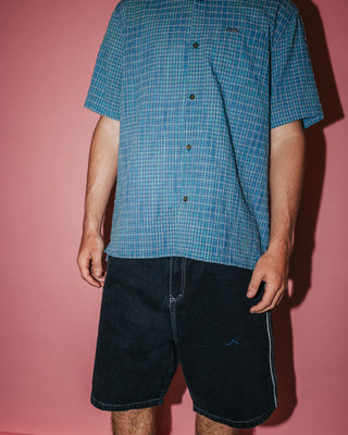 Man wearing Datsun Drop Short Sleeve Shirt in China Blue