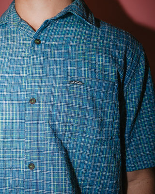 Man wearing Datsun Drop Short Sleeve Shirt in China Blue