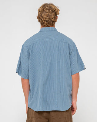Man wearing Acemo Check Short Sleeve Shirt in China Blue