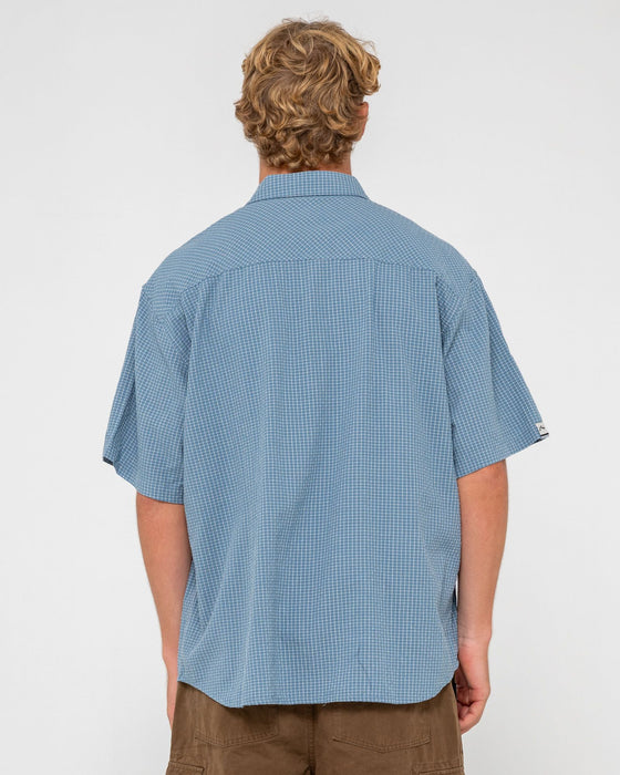 man-wearing-acemo-check-short-sleeve-shirt-in-china-blue