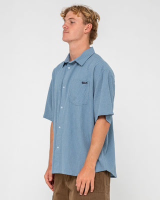Man wearing Acemo Check Short Sleeve Shirt in China Blue
