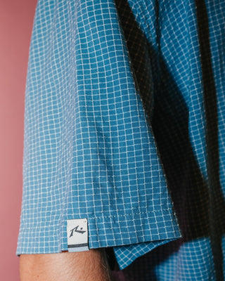 Man wearing Acemo Check Short Sleeve Shirt in China Blue