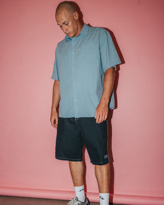 Man wearing Stasha Pocket Short Sleeve Shirt in China Blue