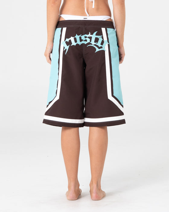 woman-wearing-farrah-long-boardshorts-in-java