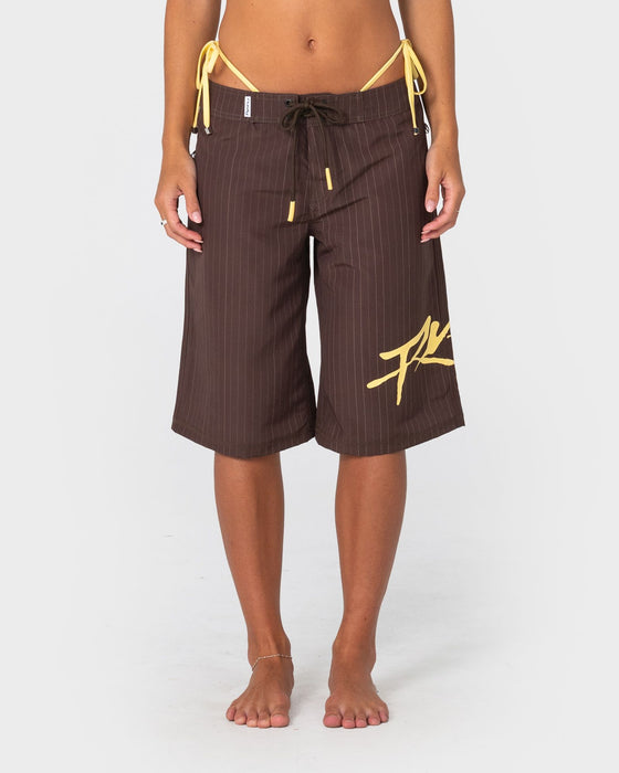 woman-wearing-cyberpunk-fixed-waist-boardshort-in-java-yellow