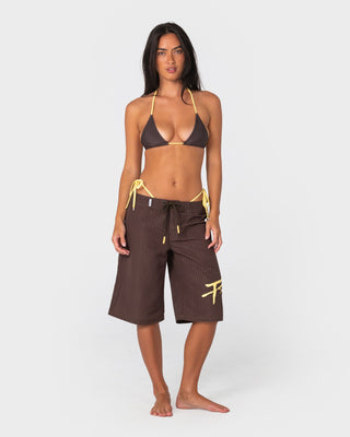 woman-wearing-cyberpunk-fixed-waist-boardshort-in-java-yellow