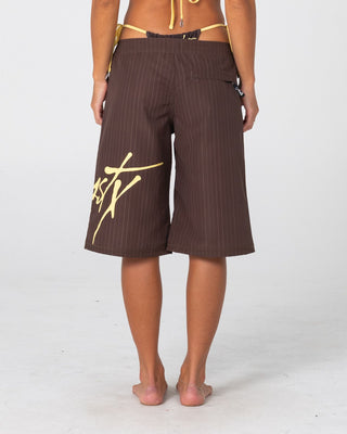 Woman wearing Cyberpunk Fixed Waist Boardshort in Java / Yellow