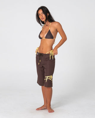 Woman wearing Cyberpunk Fixed Waist Boardshort in Java / Yellow
