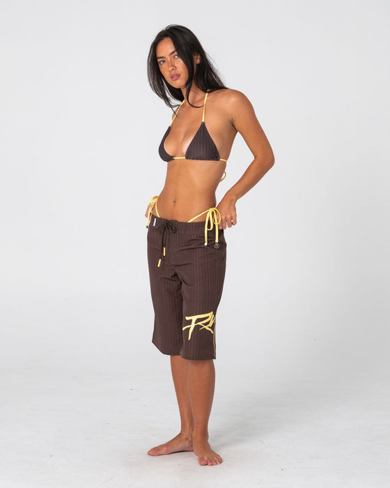 woman-wearing-cyberpunk-fixed-waist-boardshort-in-java-yellow
