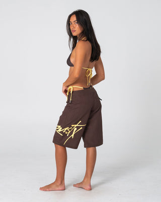 Woman wearing Cyberpunk Fixed Waist Boardshort in Java / Yellow