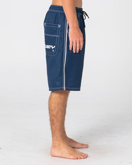 man-wearing-flip-daddy-boardshort-in-navy-blue-4