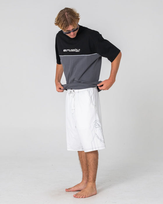 man-wearing-tombstones-hybrid-waist-boardshort-in-white