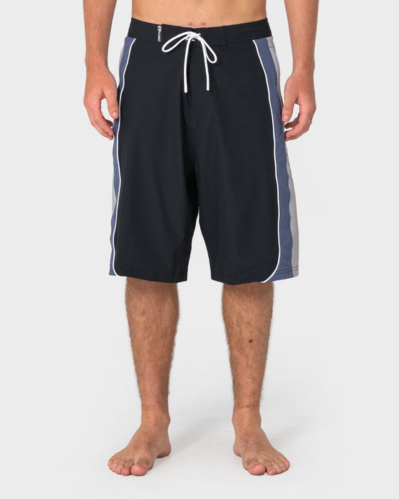 man-wearing-power-wing-fixed-waist-boardshort-in-black-grey