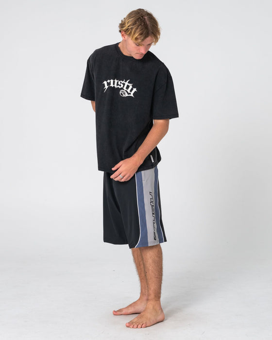 man-wearing-power-wing-fixed-waist-boardshort-in-black-grey