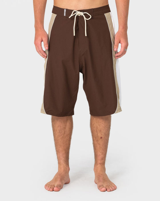 man-wearing-power-wing-fixed-waist-boardshort-in-pinecone