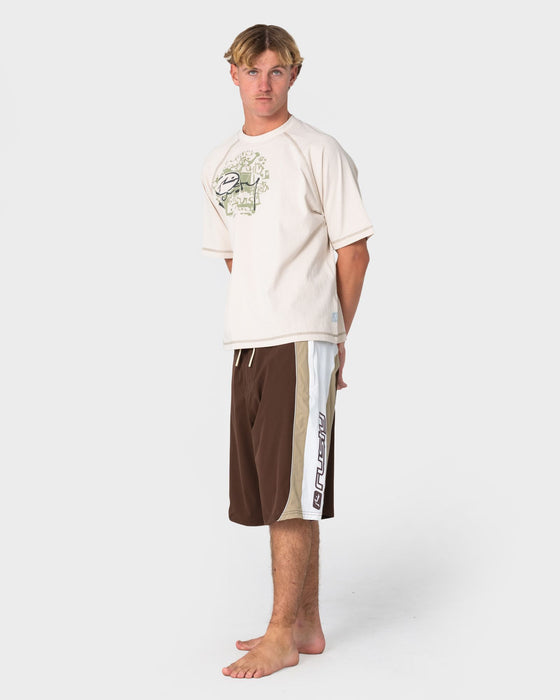 man-wearing-power-wing-fixed-waist-boardshort-in-pinecone