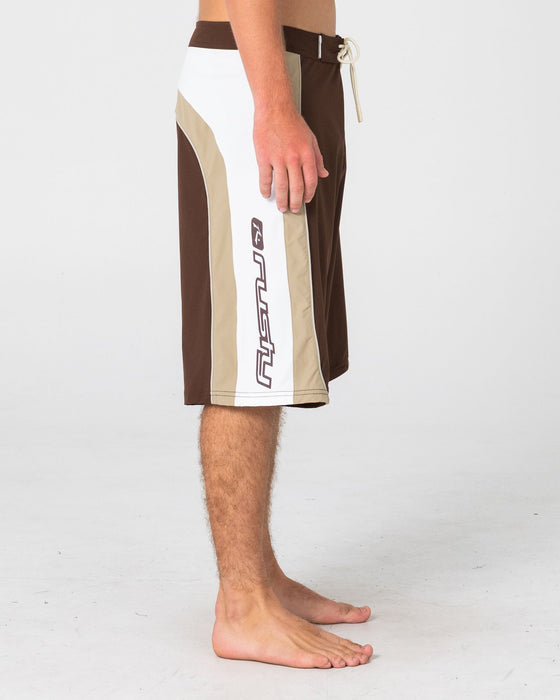 man-wearing-power-wing-fixed-waist-boardshort-in-pinecone