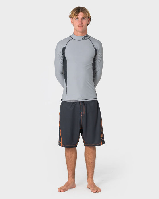 man-wearing-hydro-surge-fixed-waist-boardshort-in-black-2
