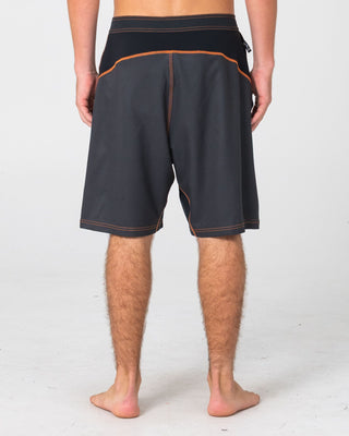 Man wearing Hydro-surge Fixed Waist Boardshort in Black 2