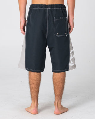 Man wearing Carnage Hybrid Waist Boardshort in Black 1