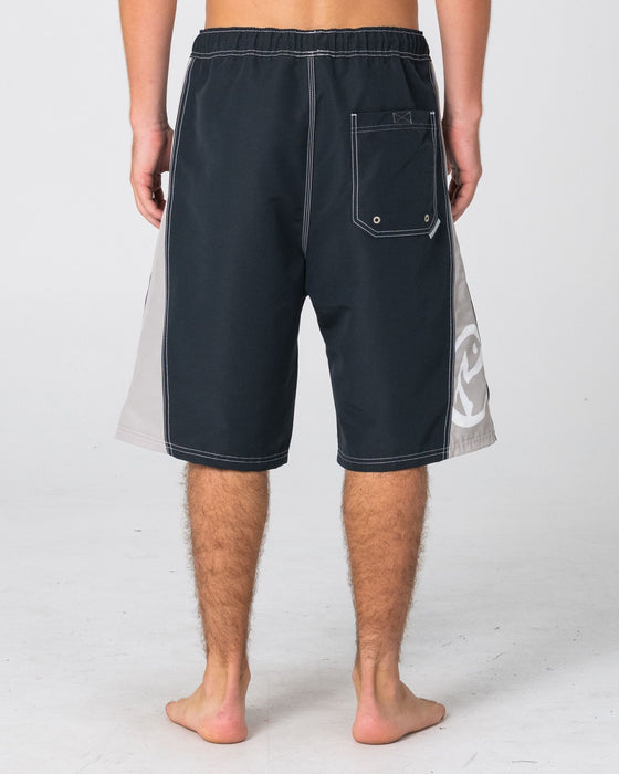 man-wearing-carnage-hybrid-waist-boardshort-in-black-1