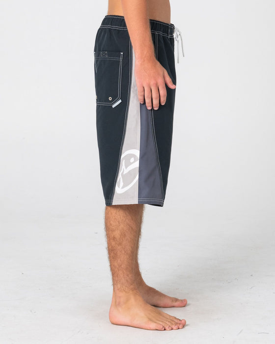 man-wearing-carnage-hybrid-waist-boardshort-in-black-1