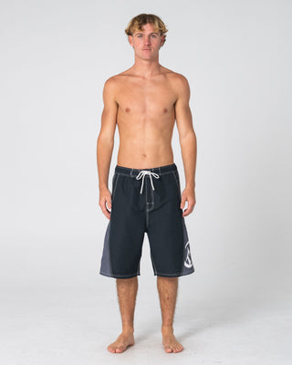 Man wearing Carnage Hybrid Waist Boardshort in Black 1