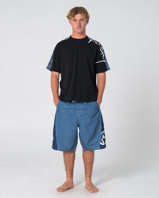 Man wearing Carnage Hybrid Waist Boardshort in China Blue