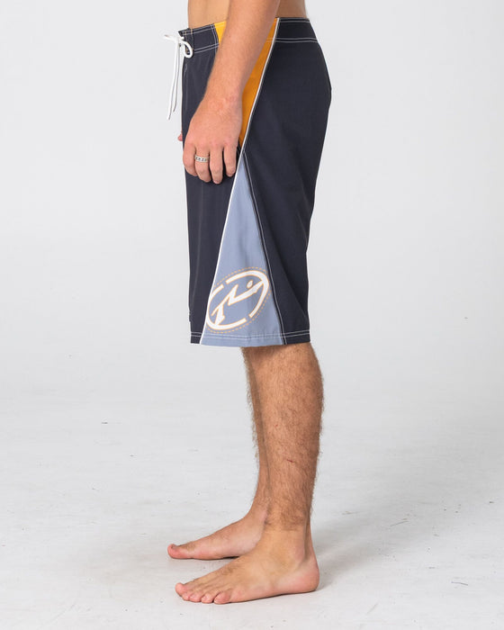 man-wearing-sandglass-fixed-waist-boardshort-in-coal