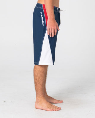 Man wearing Sandglass Fixed Waist Boardshort in Navy Blue