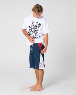 Man wearing Sandglass Fixed Waist Boardshort in Navy Blue